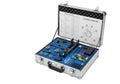 Open silver toolkit containing various technical instruments and a detailed schematic diagram on the lid Royalty Free Stock Photo