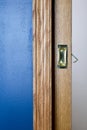 Open pocket door concealed with a wall cavity