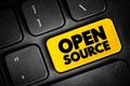 Open Source is source code that is made freely available for possible modification and redistribution, text button on keyboard Royalty Free Stock Photo