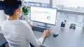 In Open Space Office Businesswoman Working on Her Personal computer with Financial Data, Graphs an Royalty Free Stock Photo