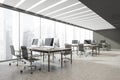 Open space office interior with panoramic view and grey concrete floor Royalty Free Stock Photo