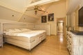 Open spaced, sand and beige bedroom