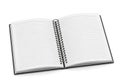 Open spiral bound notebook with blank lined pages ready for writing or drawing Royalty Free Stock Photo