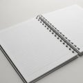 Open Spiral- Bound Notebook with Lined Pages on a Light Surface spiral bound lined paper Royalty Free Stock Photo