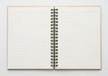 Open spiral bound notebook with lined pages isolated on white background Royalty Free Stock Photo