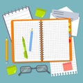 Open spiral notebook and office supplies. Royalty Free Stock Photo