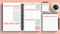 An open spiral planner with color blocks and a coffee cup on the side, suggesting planning and journaling. Royalty Free Stock Photo