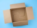 Open square empty cardboard brown box for packing and shipping things