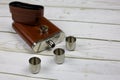 Open steel alcohol flask with brown leather