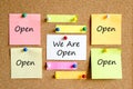 We are open sticky note text concept Royalty Free Stock Photo