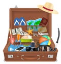 Open suitcase bag with beach travel object