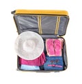 Open suitcase with packed things on white background, top view Royalty Free Stock Photo