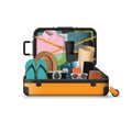 Open suitcase packed for travel. Royalty Free Stock Photo