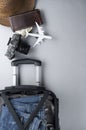 Open suitcase packed for travelling with Thailand passport on grey background - travel concept - Image Royalty Free Stock Photo