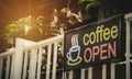 open text on a signboard of a coffee shop