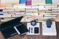 Open textbook, notebook, smartphone, laptop computer, stack of books education back to school background, paperweight, documents, Royalty Free Stock Photo