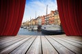 Open theater red curtains against Nyhavn city during the Christmas holidays - (Europe - Denmark - Copenhagen)