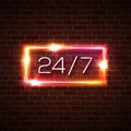 Open time 24 7 hours neon light sign on brick wall Royalty Free Stock Photo
