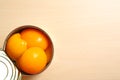 Open tin can of peaches on wooden background, top view Royalty Free Stock Photo