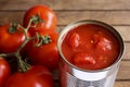 Open tin of chopped tomatoes.