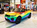 Open Top Land Rover Painted in Gay Pride Rainbow Colours Royalty Free Stock Photo