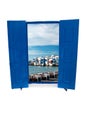 Open traditional Greek blue window on Mykonos island Royalty Free Stock Photo