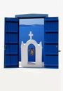 Open traditional Greek blue window on Santorini island Royalty Free Stock Photo