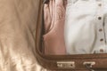 Open traveler`s bag with clothing, accessories and passport, travel and vacations concept .Travel suitcase preparation concept Royalty Free Stock Photo