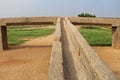 Open troughs for water supply from the Tungabhadra River to the reservoir Pushkarni, Hampi, India.