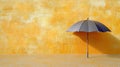 Open Umbrella Casting Shadow, Yellow Wall Background, Protection, Minimalism, Concept Royalty Free Stock Photo