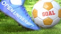 Open university and a life goal - pictured as word Open university on a football shoe to symbolize that it can impact a goal and