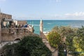 The open veranda of the Aladdin restaurant and the Al Bahr Mosque on the embankment in old Yafo in Israel