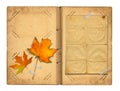 Open vintage photoalbum for photos with autumn foliage Royalty Free Stock Photo