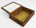 Open vintage wooden jewelry box isolated on white, empty antique trinket box
