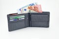 Open male wallet with banknotes euro currency Royalty Free Stock Photo