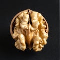 Open Walnut Kernel on a Dark Background Royalty Free Stock Photo