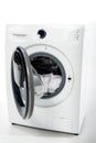 open washing machine with clothes Royalty Free Stock Photo