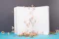 Open white book page, wooden letters falling down, school and education concept, copy space Royalty Free Stock Photo