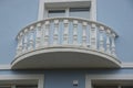 Open white concrete balcony with door and windows Royalty Free Stock Photo