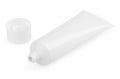 Open white cosmetic tube with cream Royalty Free Stock Photo