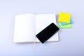 Open White notepad with colorful sticky reminder notes Royalty Free Stock Photo