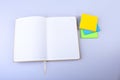 Open White notepad with colorful sticky reminder notes Royalty Free Stock Photo