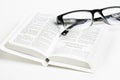 White Pocket Bible With Reading Glasses Royalty Free Stock Photo