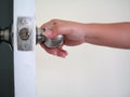 Open the door with a key. Royalty Free Stock Photo