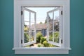 Open window to the back yard with small shed. Royalty Free Stock Photo