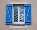 Open window in Tropical Background. Window, Palm Tree and Blue Sky with Snow-White Clouds on a Sunny Hot Day Royalty Free Stock Photo