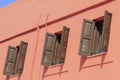 Open windows with wooden shutters Royalty Free Stock Photo