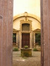 Open door of a cloister in a church of Gaeta in Italy.