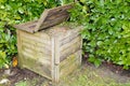 Open wooden compost ecological bin with organic material Royalty Free Stock Photo