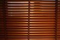 Open wooden venetian blinds. lighting range control sunlight coming from a window. decoration interior. Modern jalousie Royalty Free Stock Photo